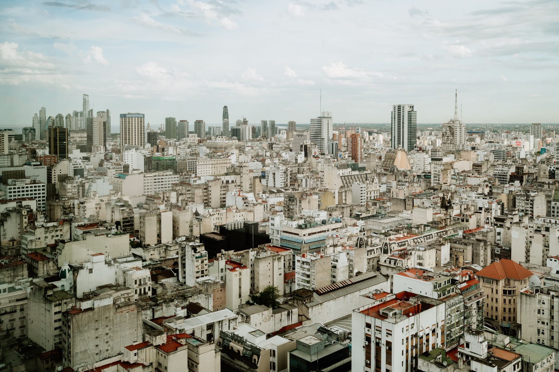 Residential tower under construction against the Argentine skyline